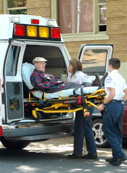 putting patient in ambulance
