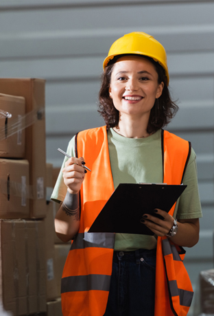 Woman checking new supplies to ensure compliance in manufacturing